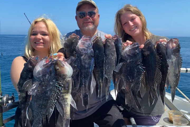 a group of people posing for the camera